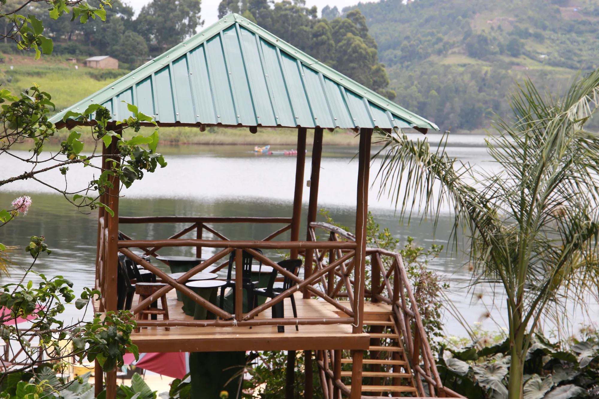 Wooden lakeside gazebo with steps, overlooking Lake Bunyonyi